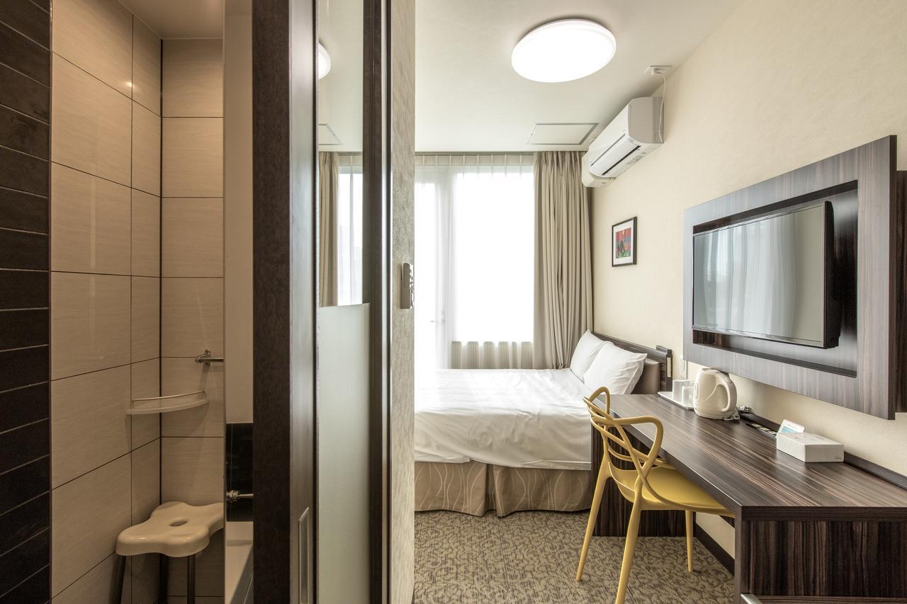 Okinawa Kariyushi Lch. Premium Hotel Naha Kamer foto